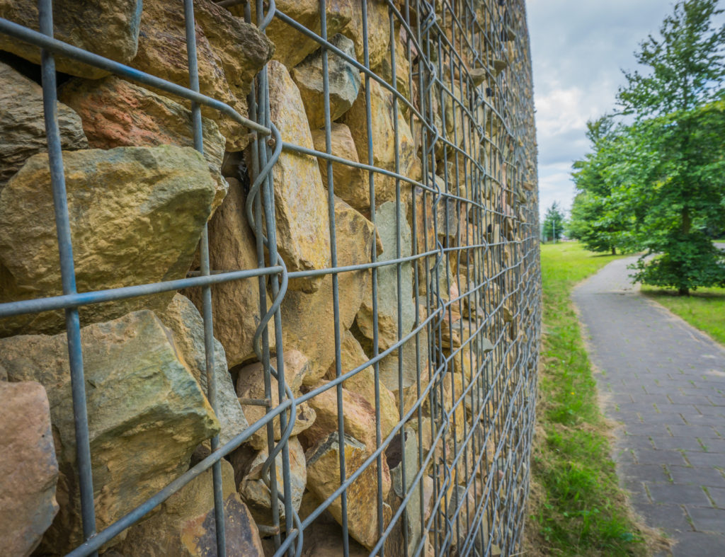a sidewalk wall stone